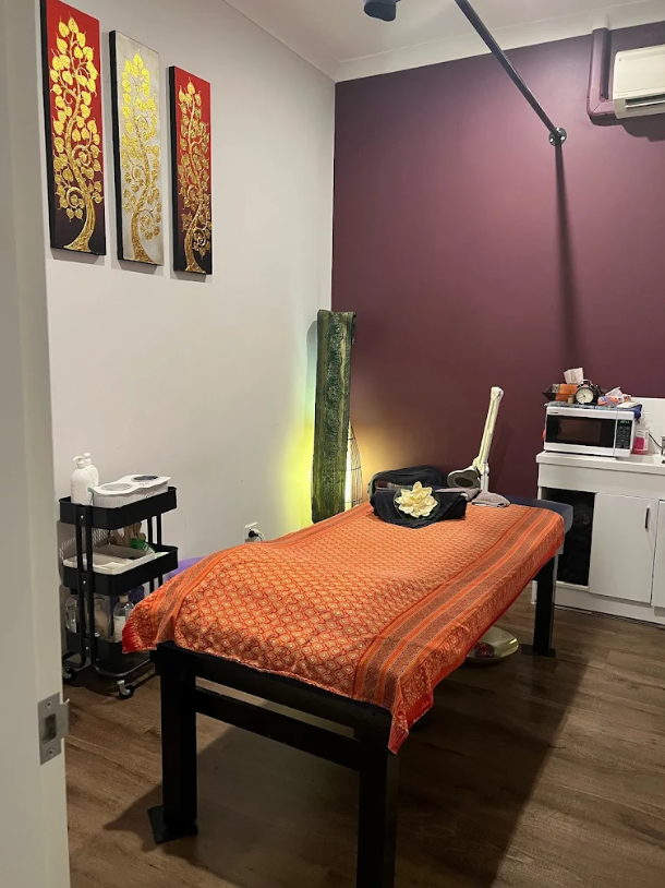 Massage room with traditional Thai decor